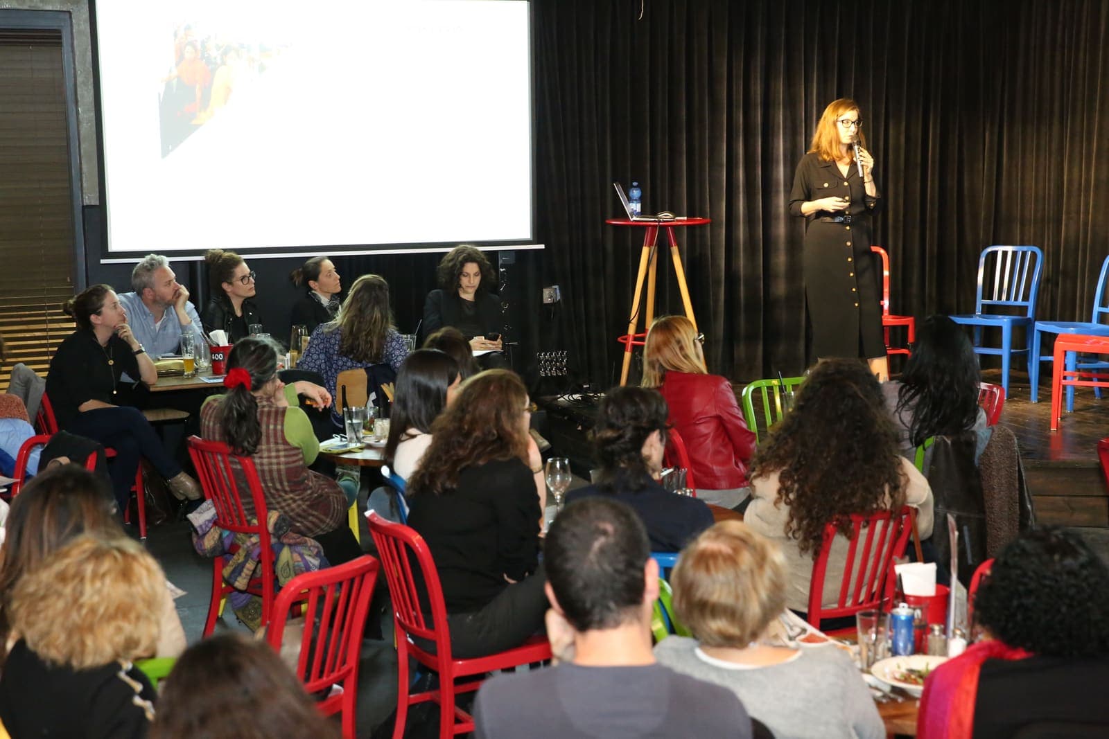 The audience listening to Michal Levi Arbel's talk